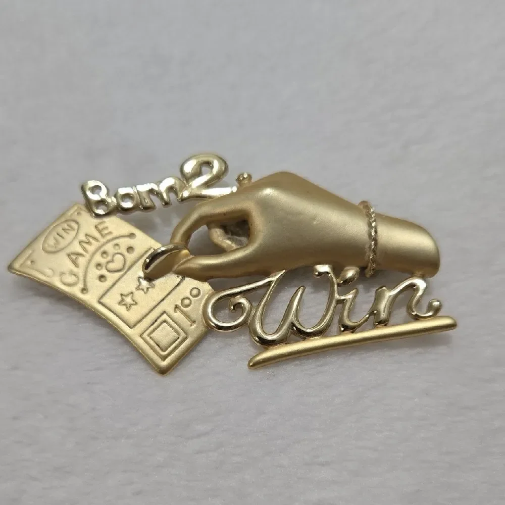 Born To Win Brooch